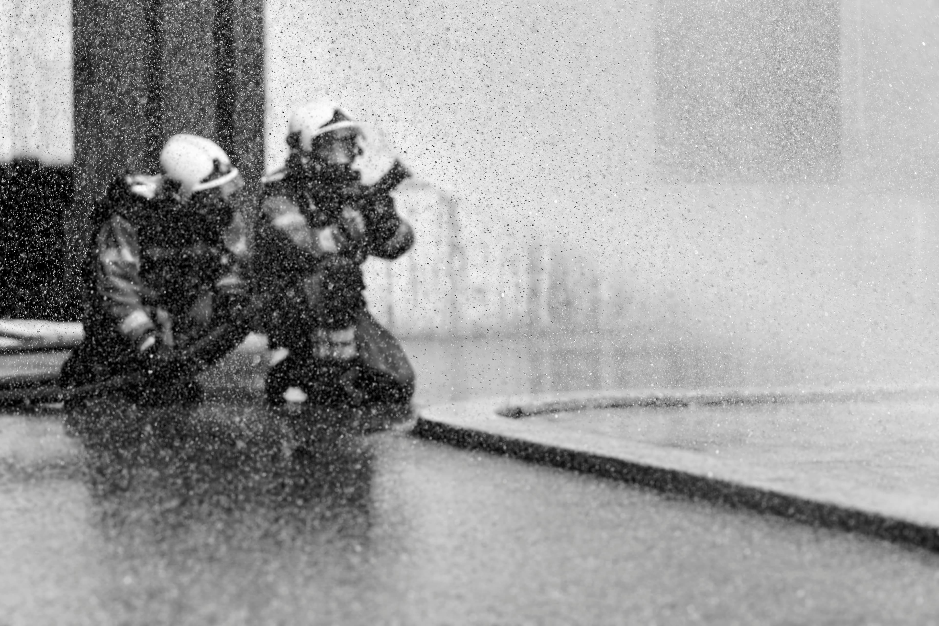 firefighter spraying water